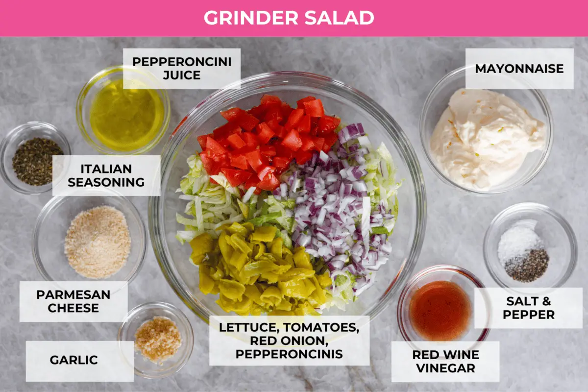 All of the ingredients for the grinder salad and dressing separated into glass bowls. - Grinder Sliders
