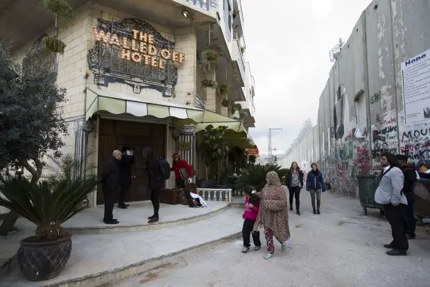 banksy walled off hotel 2 - Banksy's New Hotel In Bethlehem Promises Guests 'The Worst View In The World"