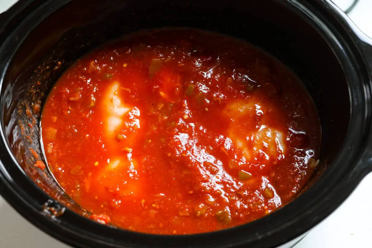Ingredients cooked and ready to shred or serve. - Crockpot Salsa Chicken