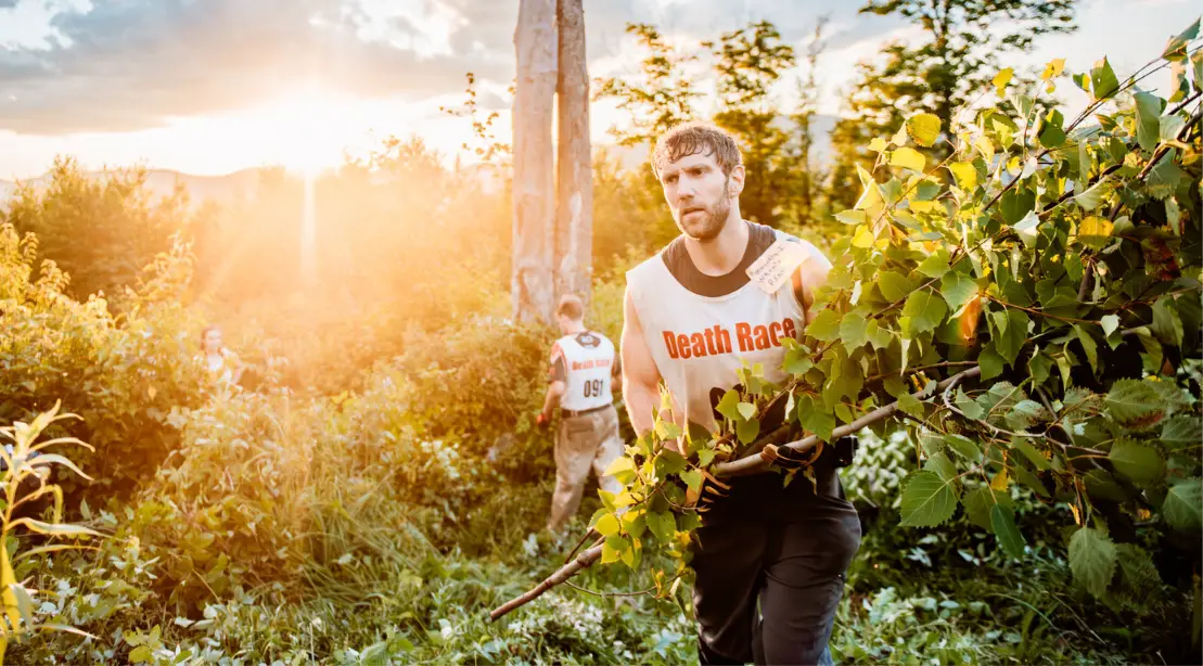 Zack Zeigler clears brush during the 2018 Death Race - Why I Keep Returning To The Spartan Death Race Despite Being 0-3