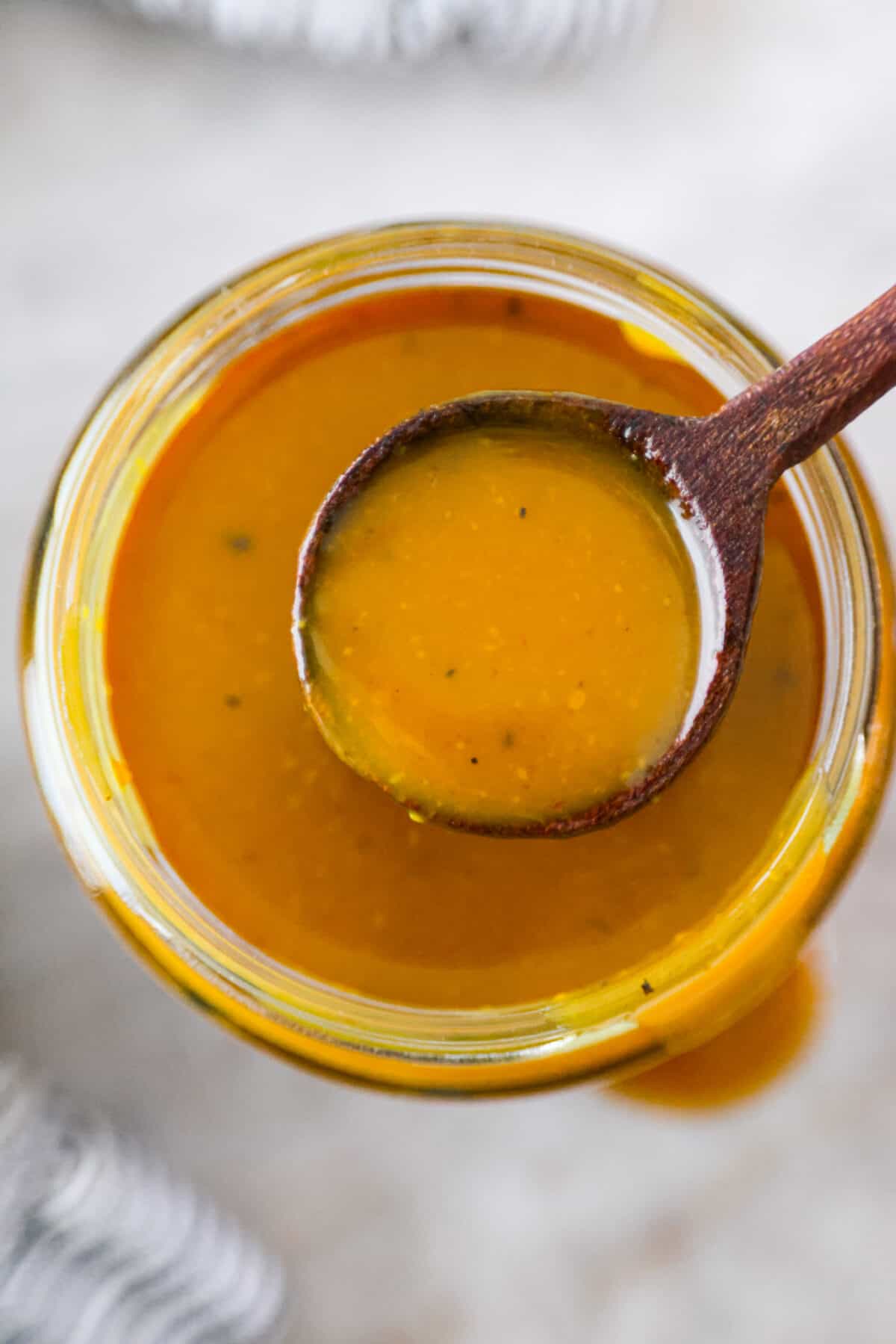 Top-down, closeup shot of mustard bbq sauce. - Mustard BBQ Sauce (Carolina BBQ Sauce)