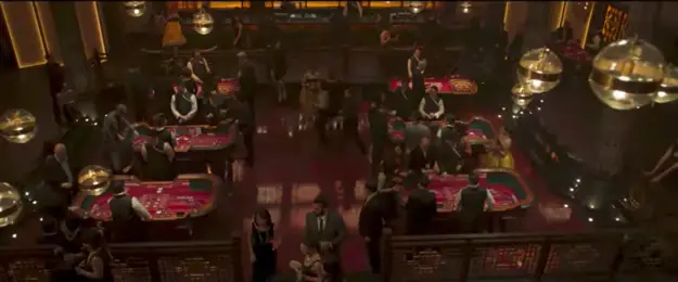 The scene is set in a fancy casino, a dimly lit establishment with people playing pool and blackjack. T - There Was An Incredible Black Panther Scene Shown At Comic-Con And It Was Everything