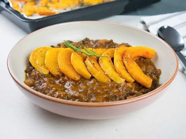 Rosemary Roasted Butternut Squash in a Lentil Tomato and Mushroom Sauce - 101 Thanksgiving Recipes With No Meat Or Dairy