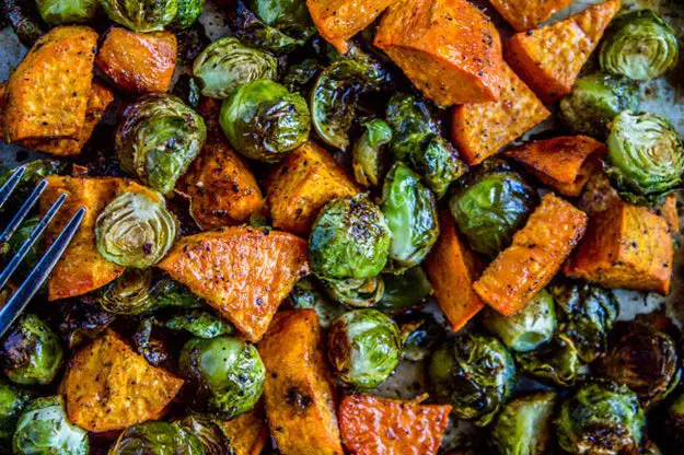 Roasted Sweet Potatoes and Brussels Sprouts - 101 Thanksgiving Recipes With No Meat Or Dairy