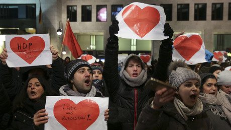 Demonstrators protest against a right wing demonstration at the Kaiser-Wilhelm-Gedaechtniskirche (Kaiser Wilhelm Memorial Church), in Berlin, Germany, December 21, 2016, after a truck ploughed through a crowd at a Christmas market in the captial on Monday night. © Axel Schmidt - Asylum Seekers Scam German Aid Program For Millions By Applying With ‘up To 12’ Fake IDs — RT News