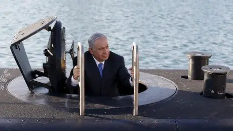 Israeli Prime Minister Benjamin Netanyahu climbs out after a visit inside the Rahav, the fifth submarine in the Israeli Navy - Israeli Police Investigate PM Netanyahu Over Corruption Allegations — RT News