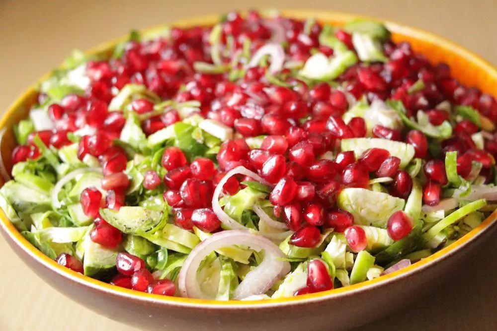 Brussels Sprouts Salad with Pomegranate: A Raw, Colorful Delight - 4 Antioxidant-Rich Salad Recipes For The Year’s First Meatless Monday