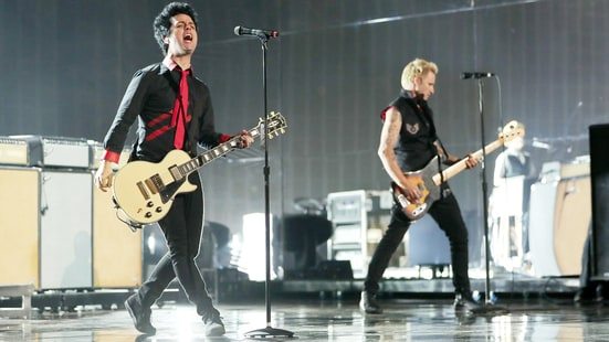 %image_alt% - Watch Green Day's Trump-Trashing 'Troubled Times' Video