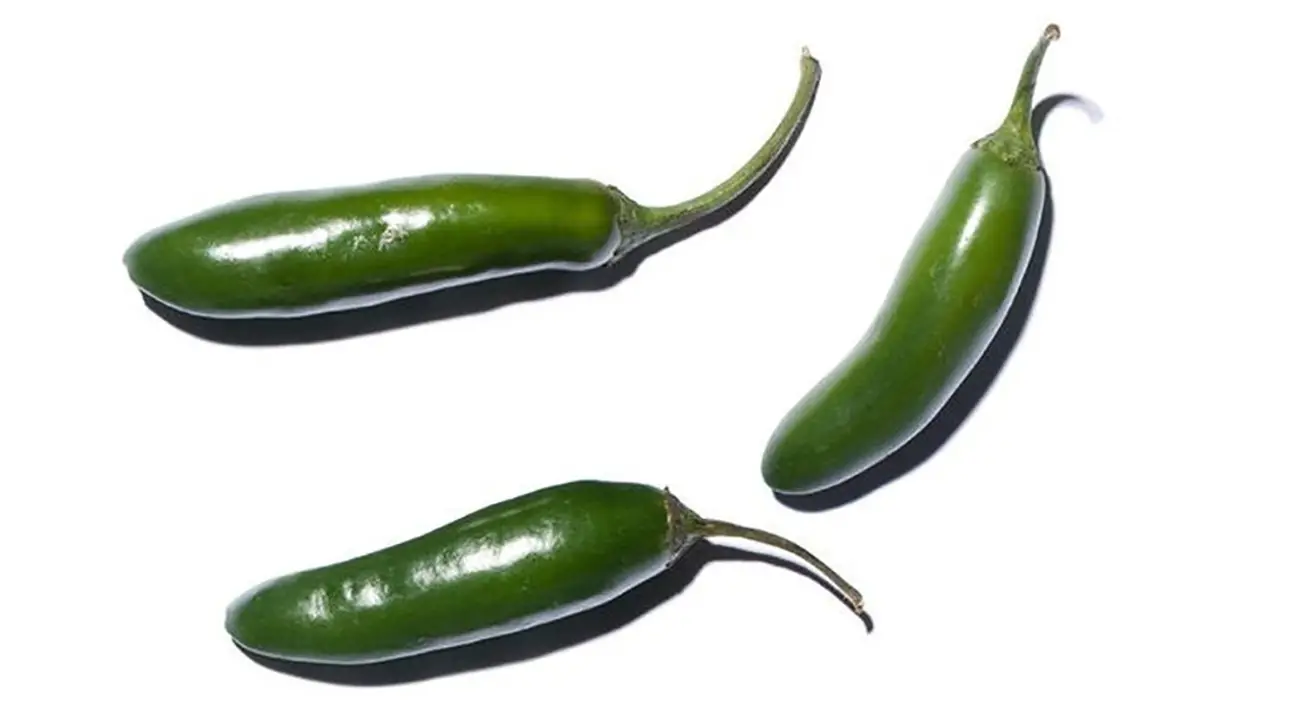 Serrano peppers - A Sizzling Hot Field Guide To Peppers — And Where They Fall On The Spiciness Scale