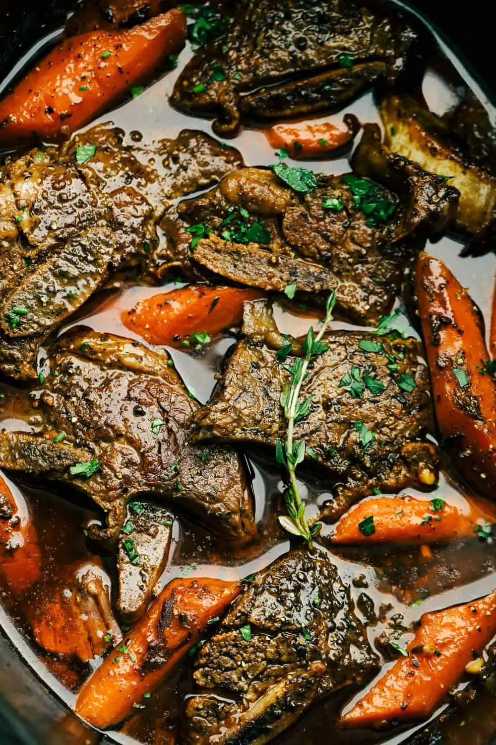 Tender, juicy flavorful Slow Cooker Short Ribs with carrots - Fall Off The Bone Slow Cooker Short Ribs
