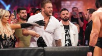 Monday Night Raw wrestler Karrion Kross in the audience taunting a professional wrestler - Karrion Kross Talks WWE Persona And Raw’s 30th Anniversary