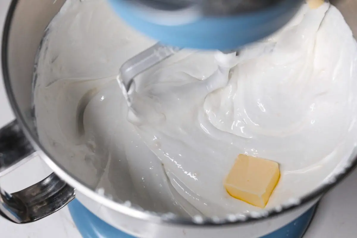 Adding butter to the Swiss meringue - Swiss Meringue Buttercream